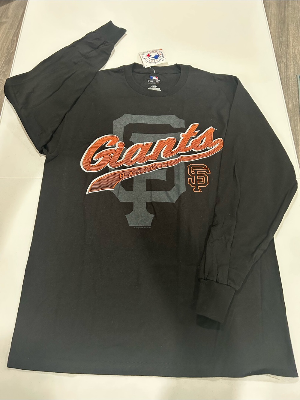 Mitchell & Ness Black Long Sleeve Giants Tee with Orange & Gray Logo